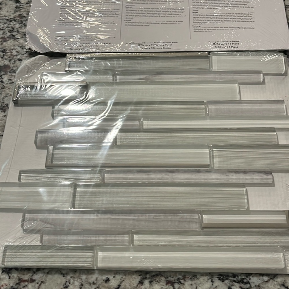 New in packaging interior Wall Tile.  Nominal dimensions 11” x 11” x 5/16”